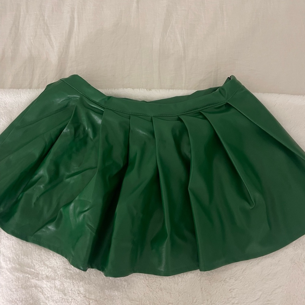 Green leather mini skirt